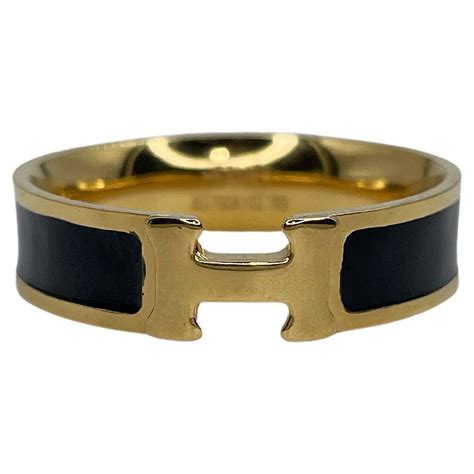 hermes ring black and gold|Hermes gold rings for sale.